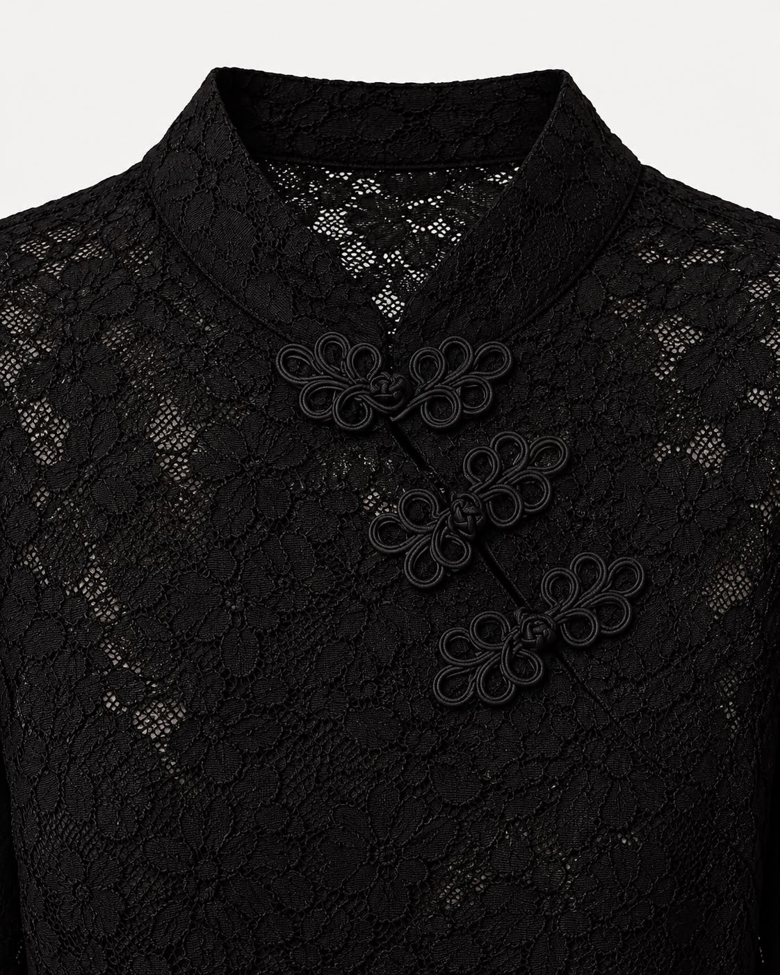 Blusa de Encaje Floral con Cierres Decorativos – Negro